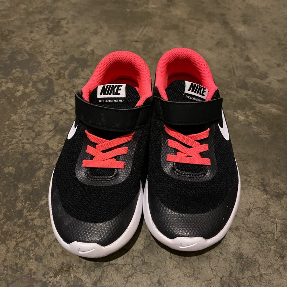 Pink and black Nike tennis